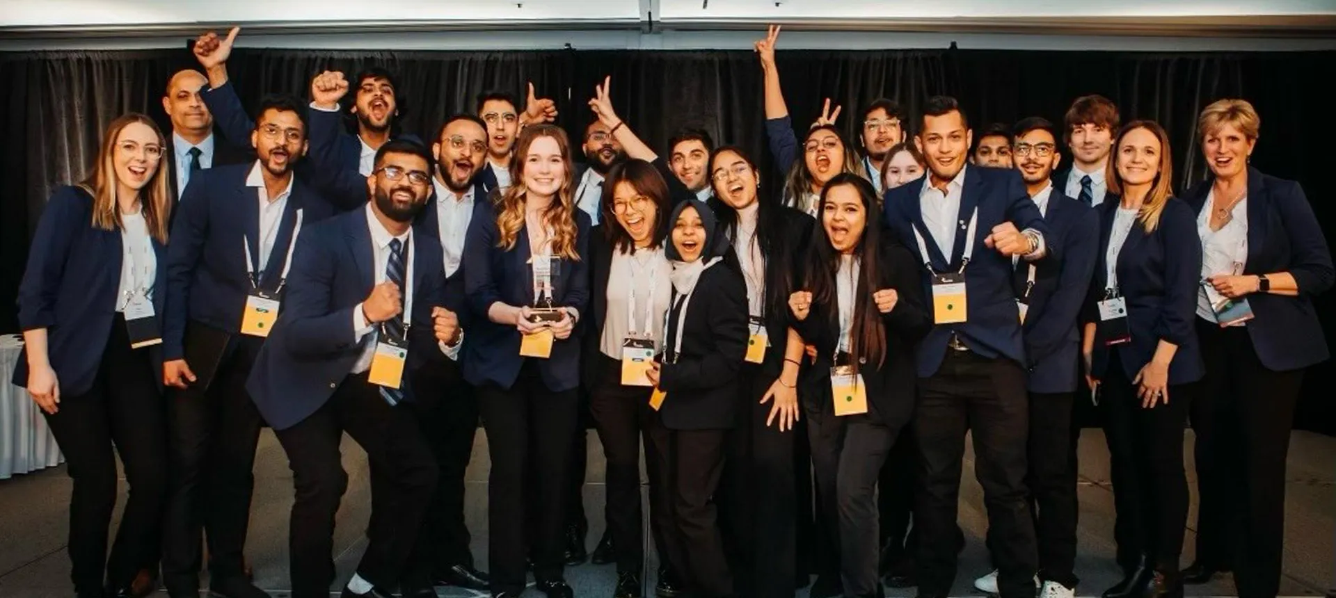 Enactus Regional Lambton College team celebrating runner up award