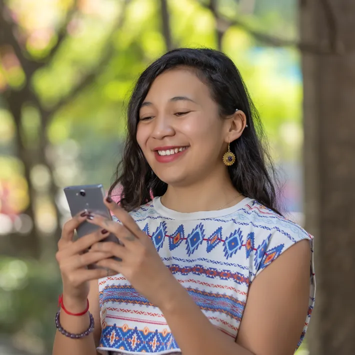 A student making a phone call outside.