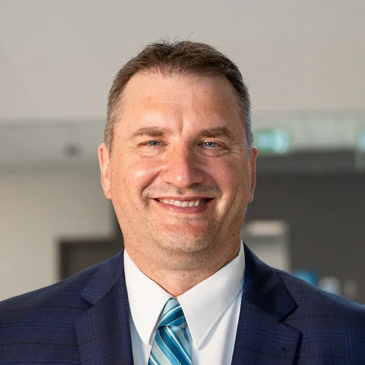 Headshot of college president Rob Kardas