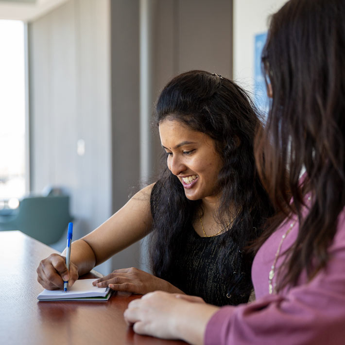 Students taking notes