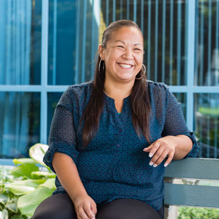 Indigenous woman in blue blouse