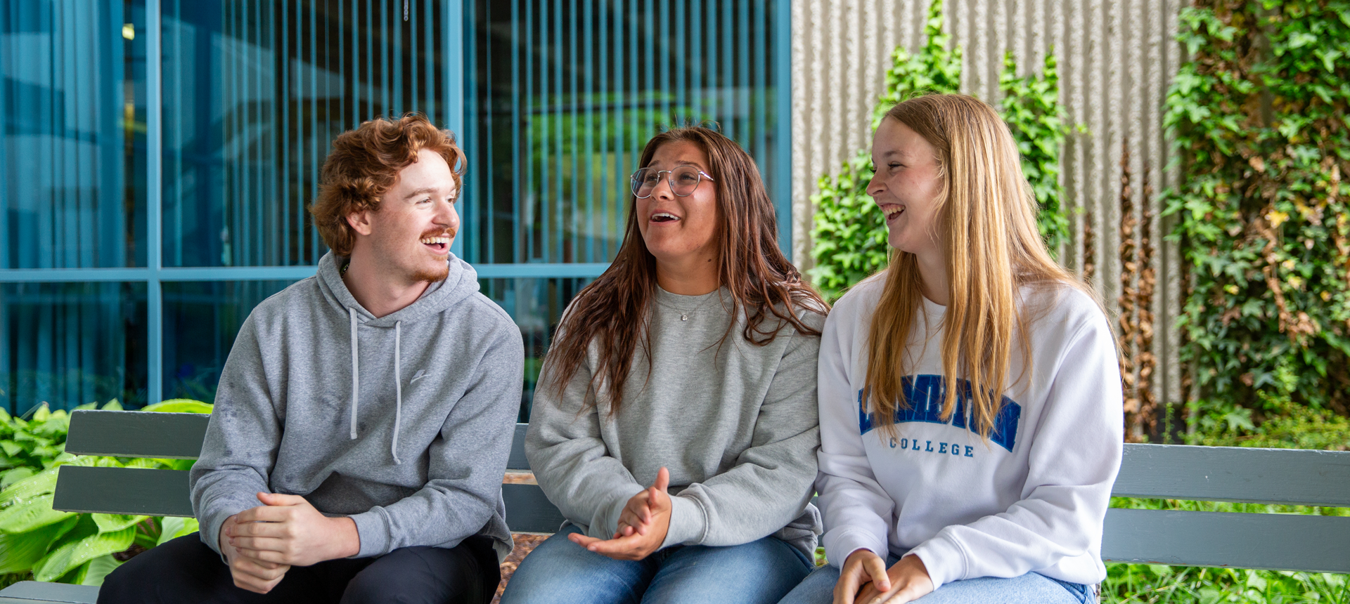 Generic Image for Students chatting on a bench outside lambton college