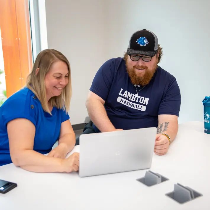 Student working together on a laptop