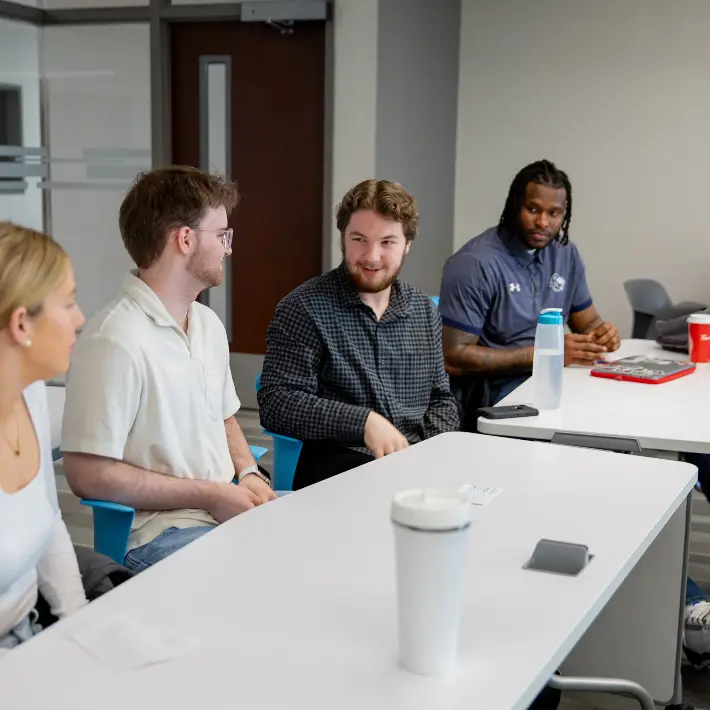 Students talking in classroom