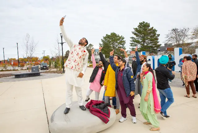 Students taking a group photo at Diwali Celebration