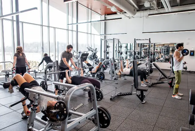 Students exercising in fitness centre