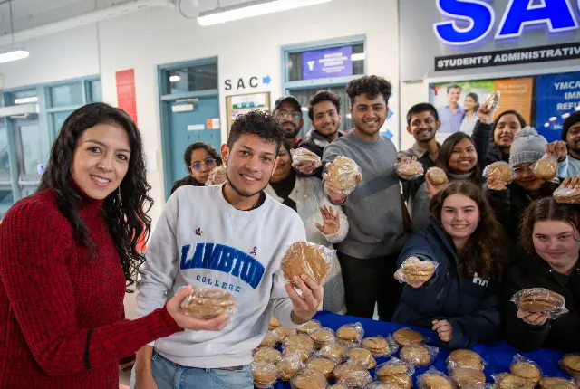 Students with cookies to deliver at SAC