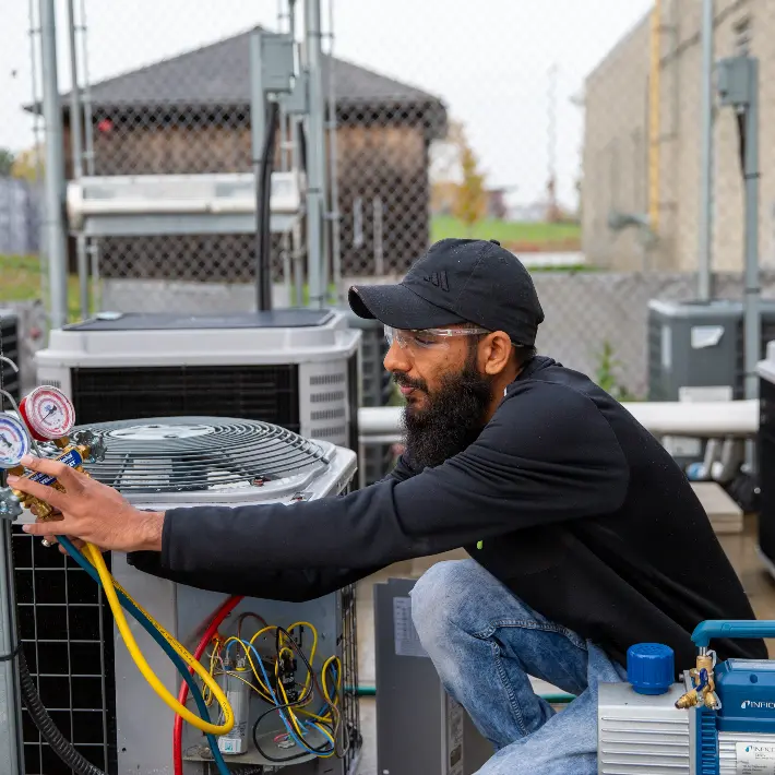 HVAC student working in a lab